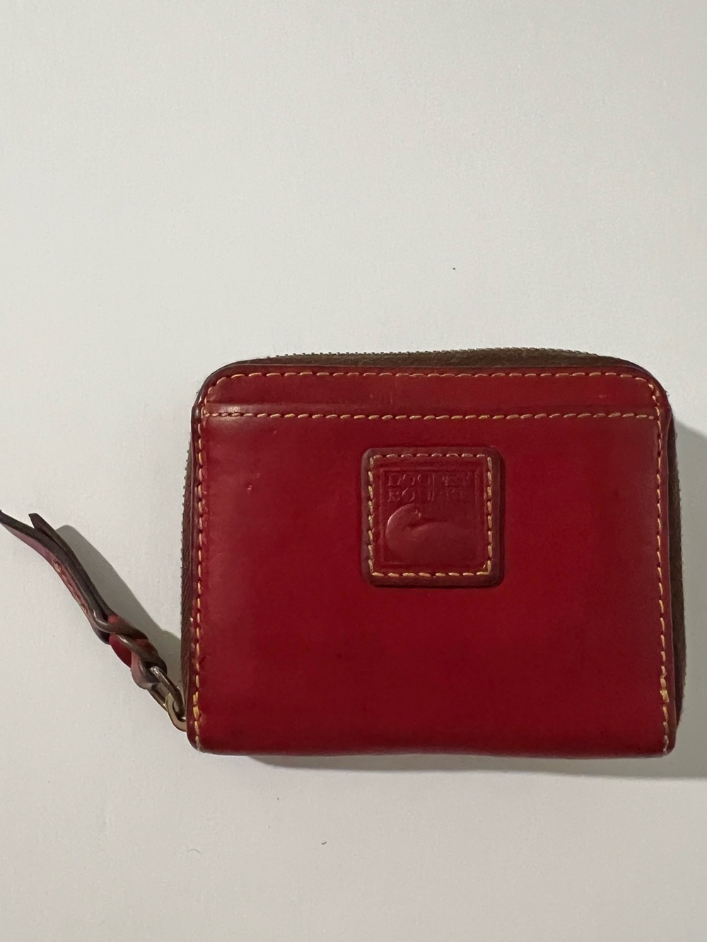 Dooney & Bourke Florentine Small Zip Around Wallet in Chestnut Red